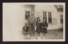 Photograph of Kitty Joyner as a child with her family